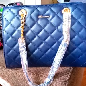 Beautiful blue purse with gold link chain handle a